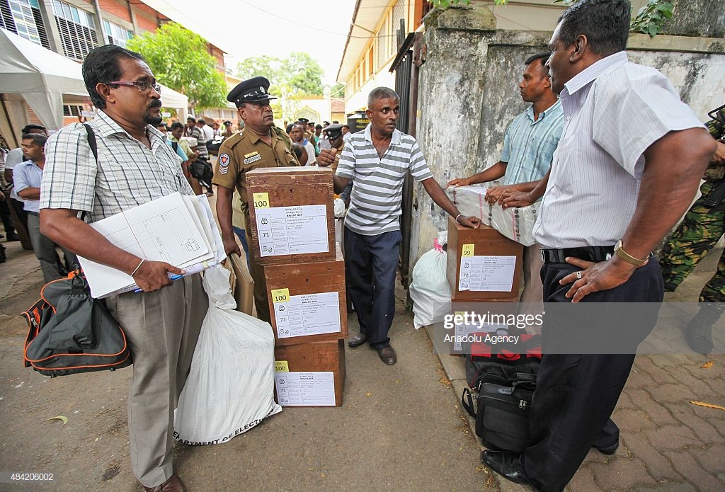 COLOMBO, SRI LANKA - AUGUST 16 : Sri Lankan election staff transport ballot boxes to polling stations for the upcoming parliamentary election on August 16, 2015 in Colombo, Sri Lanka. Sri Lanka goes to the polls on 17th August 2015. (Photo by Chamila Karunarathne/Anadolu Agency/Getty Images)