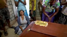 Mandatory Credit: Photo by Gemunu Amarasinghe/AP/REX/Shutterstock (10215983f)
Relatives cry near the coffin with the remains of 12-year Sneha Savindi, who was a victim of Easter Sunday bombing at St. Sebastian Church, after it returned home, in Negombo, Sri Lanka. Easter Sunday bombings of churches, luxury hotels and other sites was Sri Lanka's deadliest violence since a devastating civil war in the South Asian island nation ended a decade ago
Church Blasts, Negombo, Sri Lanka - 22 Apr 2019