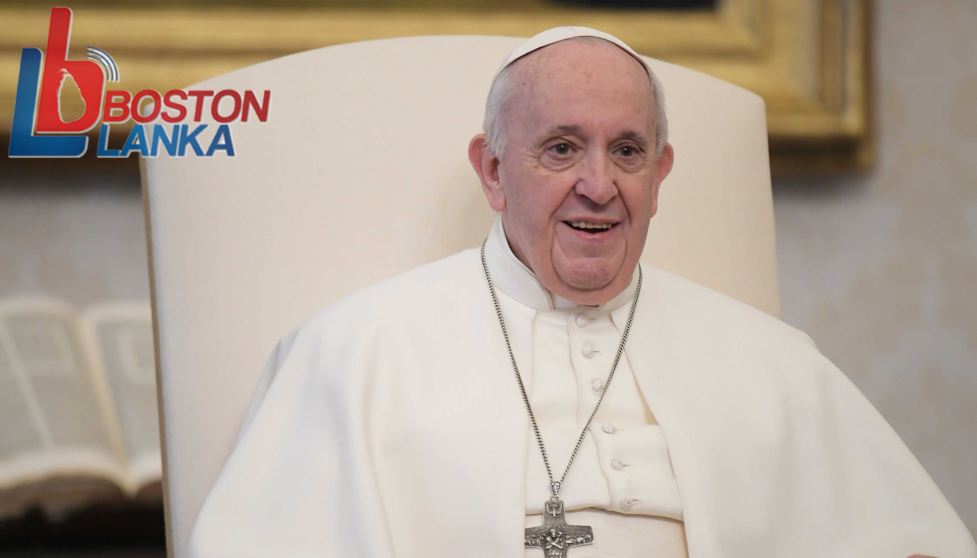 Pope Francis smiles as he leads his general audience in the library of the Apostolic Palace at the Vatican Feb. 3, 2021. (CNS photo/Vatican Media)